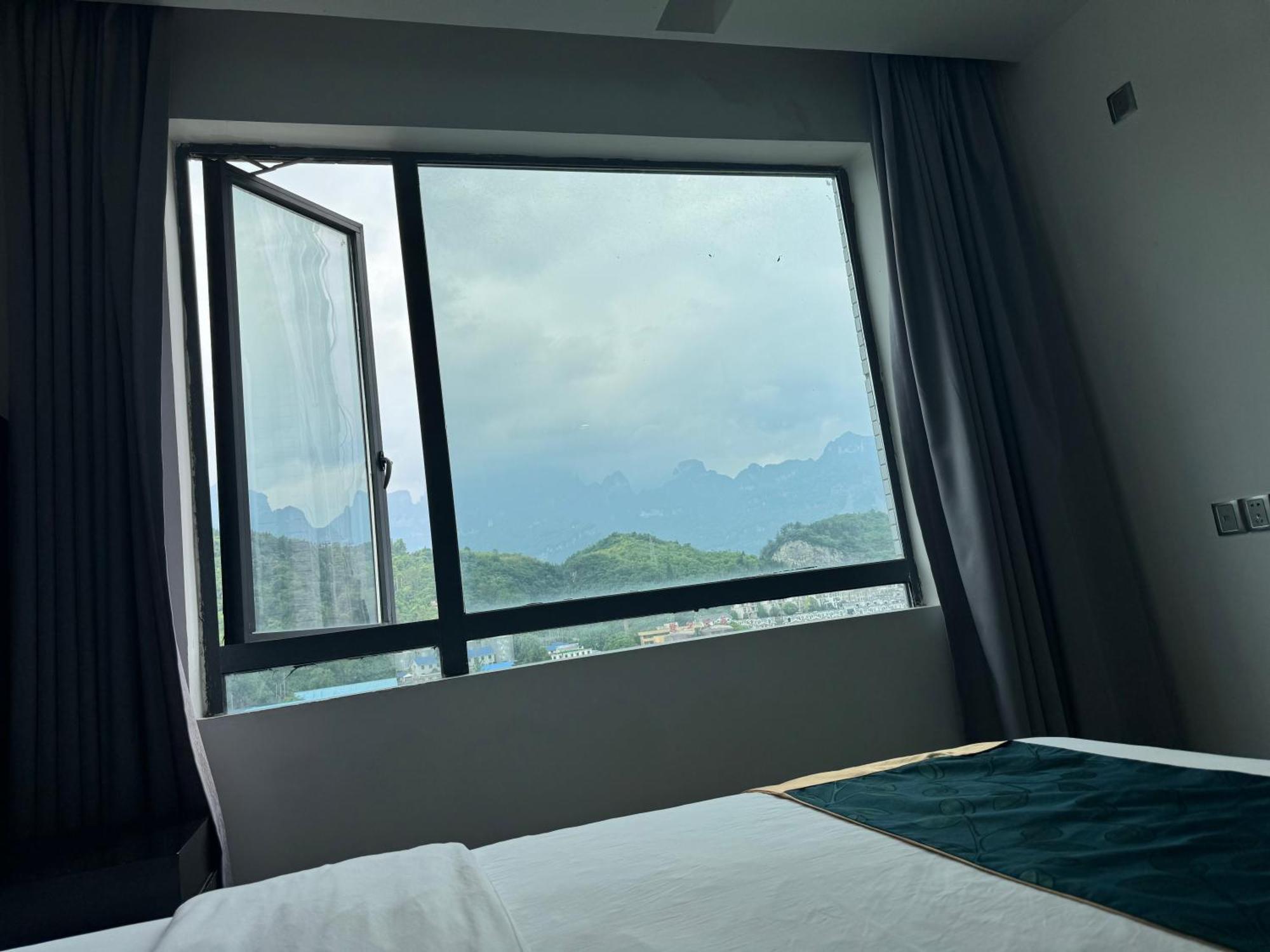 Zhangjiajie Cat Theme Inn מראה חיצוני תמונה